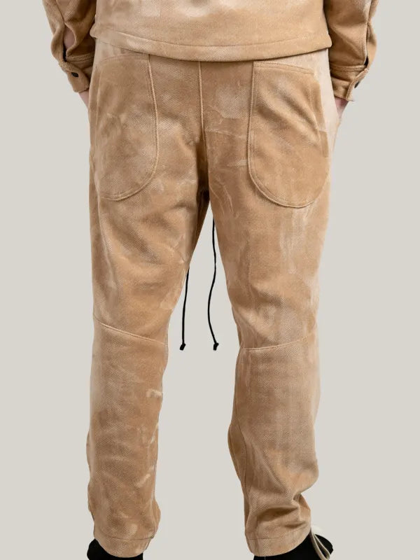 Pantaloni casual bej din material moale, cu talie elastică și șnur