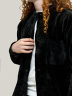 Tunica neagră raiat elastic, cu nasturi